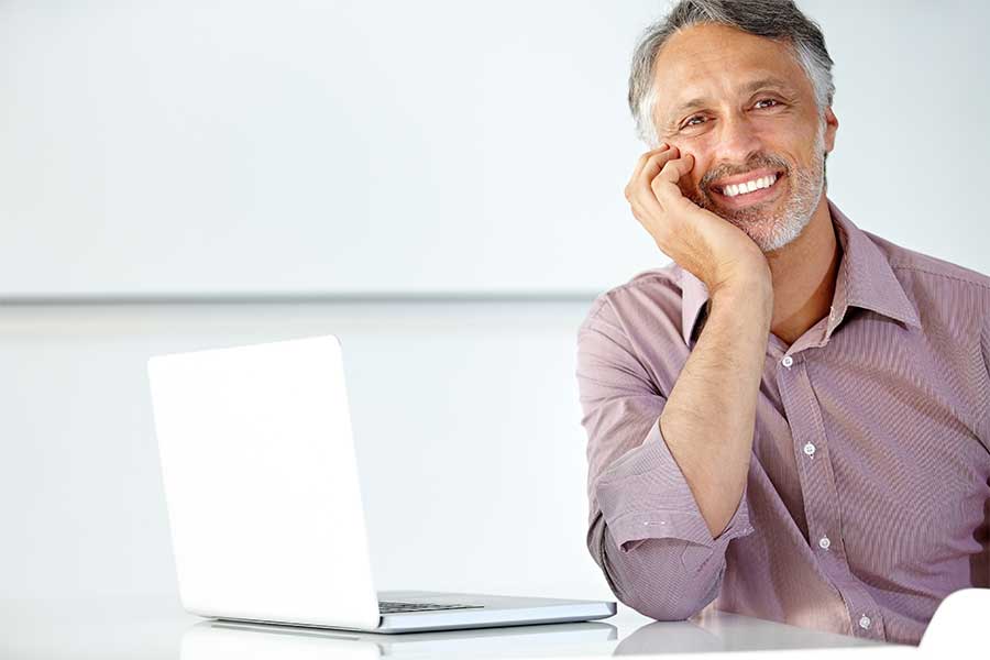 Happy middle aged man smiling